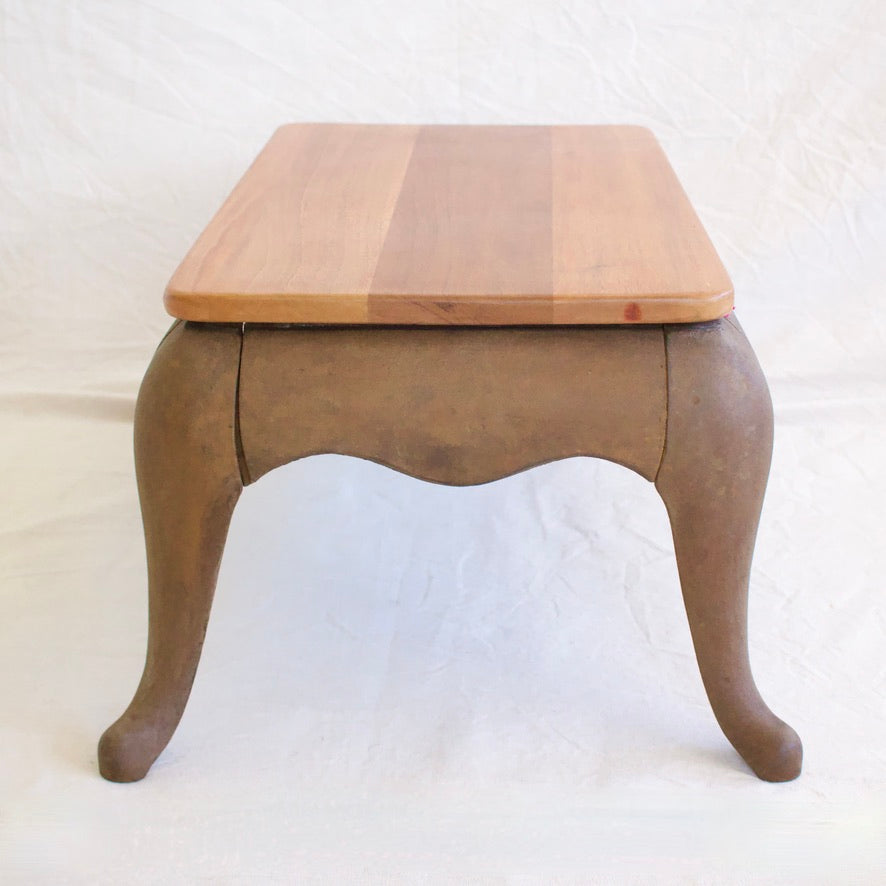 Mahogany top coffee table with iron base