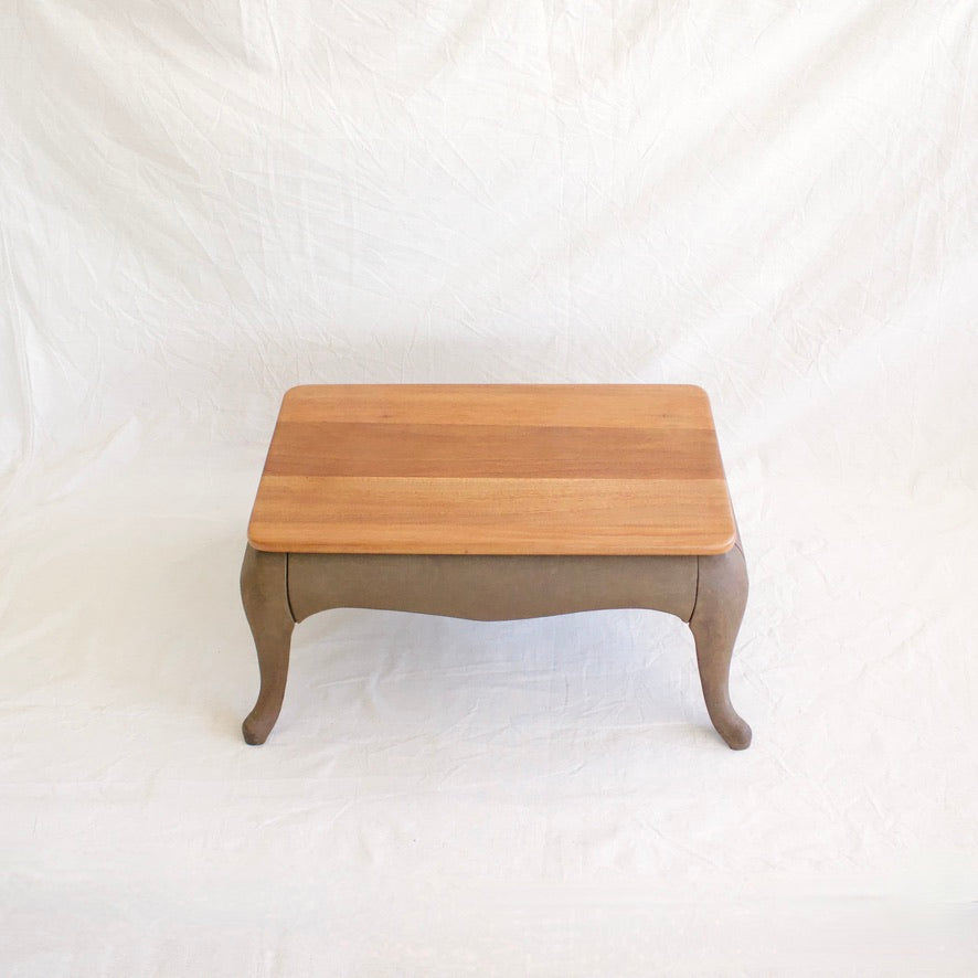 Mahogany top coffee table with iron base