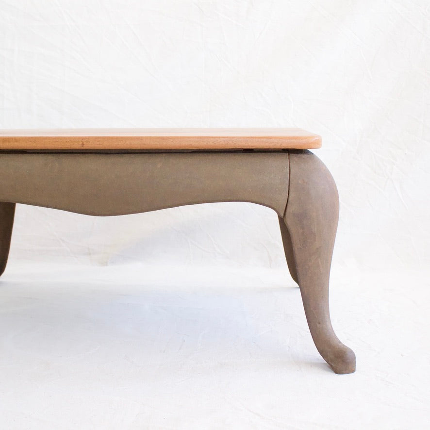 Mahogany top coffee table with iron base