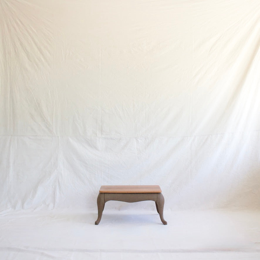 Mahogany top coffee table with iron base